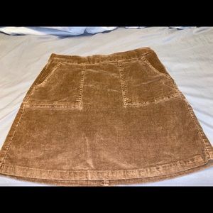 A light brown skirt.